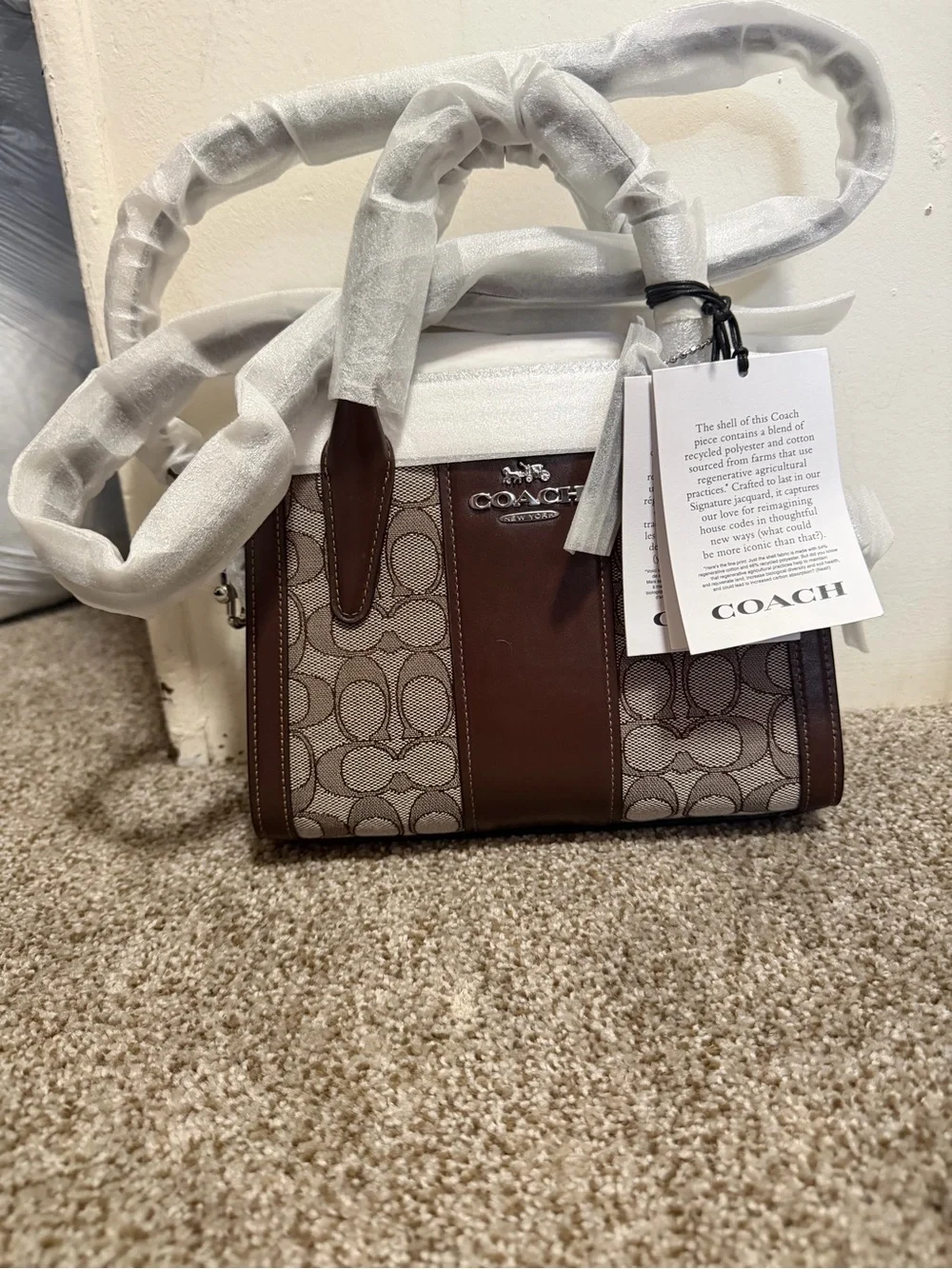 Coach Signature purse with Brown Leather Trim